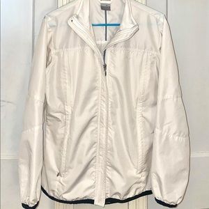Stunning Vintage Cream Nike Lightweight Jacket on a Y2k Tag